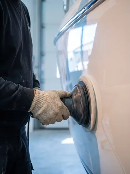 Polishing the gelcoat on a white hull